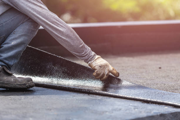 Professional Waterproofing technician working in Conover, OH